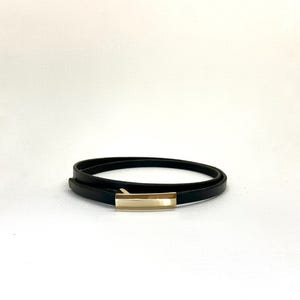 An elegant leather belt from genuine leather 1 cm width and a versatile golden buckle