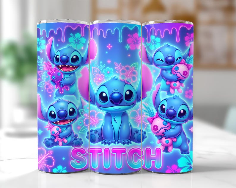 May include: A set of three stainless steel tumblers featuring a vibrant design of the character Stitch from Lilo & Stitch. The design includes Stitch holding a doll, surrounded by flowers, with the word "STITCH" at the bottom. The tumblers have a blue and pink color scheme.