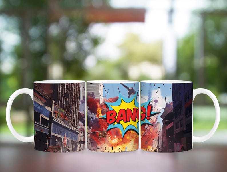 May include: White ceramic coffee mug featuring a comic book-style illustration of an urban explosion with the word "BANG!" in a yellow and blue speech bubble. The mug depicts city buildings and a fiery explosion.