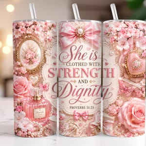 May include: A pink tumbler with a floral design, featuring roses, butterflies, and pearls. The tumbler has the text "She is clothed with Strength and Dignity" and a quote from Proverbs 31:25. The tumbler includes a clear straw.