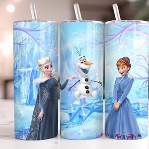 May include: Three stainless steel tumblers with clear straws. Each tumbler features a different character from the movie Frozen: Elsa, Olaf, and Anna. The background is a blue and white winter scene.
