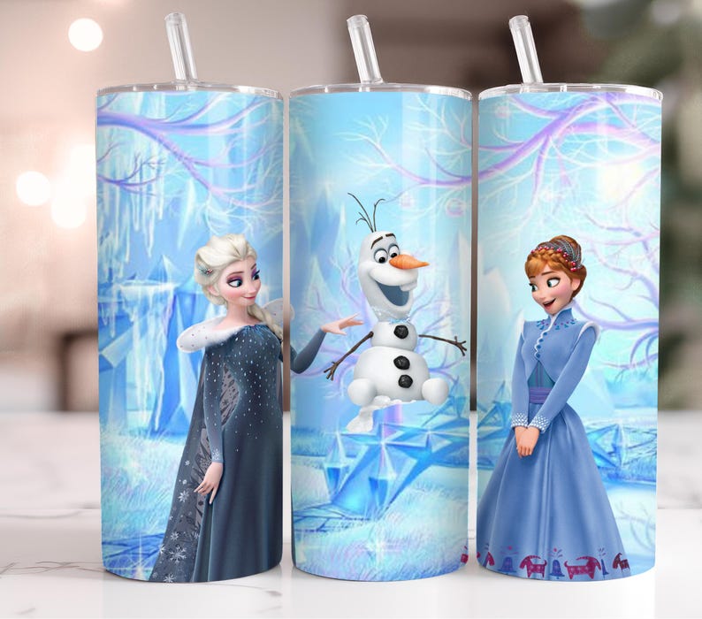 May include: Three stainless steel tumblers with clear straws. Each tumbler features a different character from the movie Frozen: Elsa, Olaf, and Anna. The background is a blue and white winter scene.