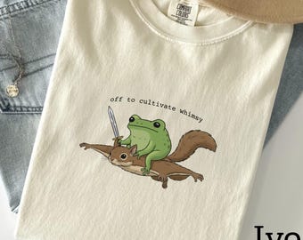 Funny Frog Shirt: "off to cultivate whimsy" Frog Riding a Flying Squirrel, Humorous Funny Comfort Colors Tee