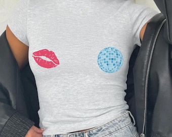 Kiss and Disco Nips Baby Tee: Y2K Cropped T-Shirt Featuring Pink Lipstick Kiss and Blue Disco Ball, 2000s 90s Aesthetic Graphic Tee Style