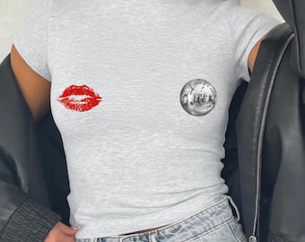 Kiss and Disco Nips Baby Tee: Y2K Cropped T-Shirt Featuring Red Lipstick Kiss and Disco Ball, 2000s 90s Aesthetic Graphic Tee Style