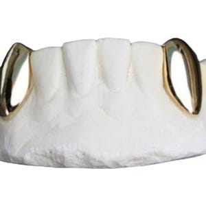 Custom Single Grillz: Solid Gold or Silver Tooth Cap