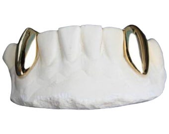 Custom Single Grillz: Solid Gold or Silver Tooth Cap