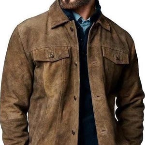 May include: A brown suede jacket with two chest pockets and button closures. The jacket is worn over a dark blue sweater and a light blue collared shirt. The jacket has a classic, casual style.