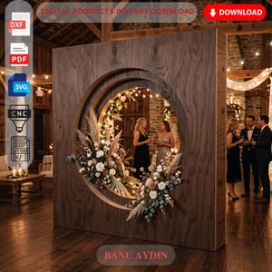 May include: A large square wooden backdrop featuring a central circular cutout, decorated with white flowers, pampas grass, and warm string lights. This digital product includes DXF, PDF, SVG, and G-code files for CNC machines, labeled as a digital download.