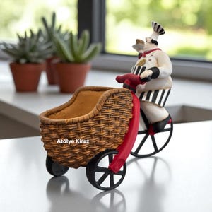 Hand-Painted Chef Figurine Sculpture on Bicycle – Colorful Kitchen Decor – Whimsical Chef Statue – Handmade Collectible Gift