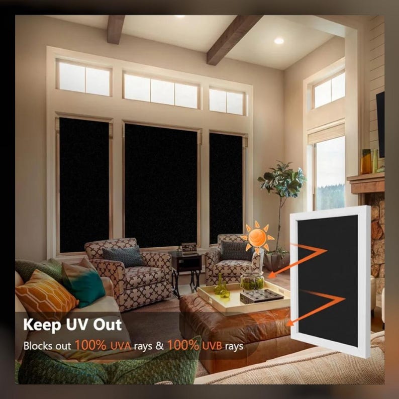 May include: Blackout window film installed on a window in a living room. The film blocks out 100% of UVA and UVB rays. "Keep UV Out" text is visible at the bottom of the image.