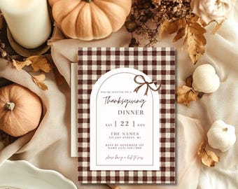 May include: A rectangular Thanksgiving dinner invitation card featuring a brown and white gingham pattern border. The center displays an arched white frame with a brown ribbon bow, containing text details for a dinner event on Saturday, November 22nd.