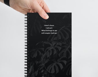 I don't chase, I attract. What belongs to me will find me. Manifestation Spiral notebook