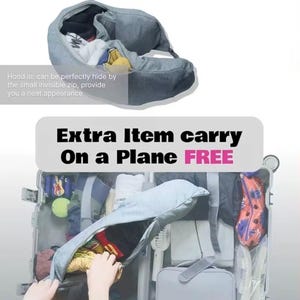 May include: A gray travel pillow with a hidden compartment, shown open and filled with clothing. The image includes the text "Extra Item carry On a Plane FREE". The pillow is designed to provide a neat appearance.