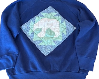 Sudadera vintage Fruit of the Loom azul vintage con apliques florales y manga raglán, talla XL.