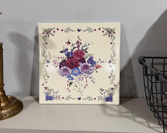 Vintage keramische wandplaat met bloemen