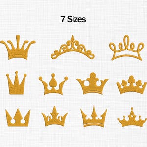 May include: Nine gold-coloured crown designs, each with a unique shape and style. The text "7 Sizes" is displayed above the crowns. The crowns are embroidered on a white, textured background.