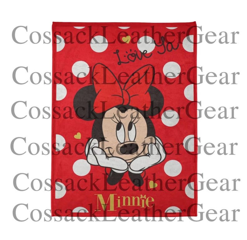 May include: Red blanket with white polka dots and a Minnie Mouse graphic. The blanket features Minnie's face, a red bow, and the words "Love ya" and "Minnie".