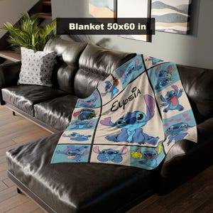 May include: A beige and blue blanket featuring the character Stitch from Lilo & Stitch. The blanket is 50x60 inches and has a grid pattern with various images of Stitch. The name "Elysia" is also printed on the blanket.