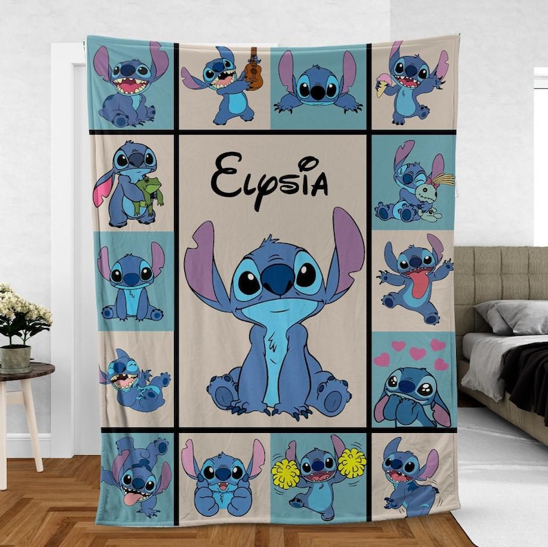 May include: A blue fleece blanket featuring a grid of Stitch character illustrations in various poses. The central panel displays a large Stitch image, with the name "Elysia" in black script. The blanket has a light blue and beige color scheme.