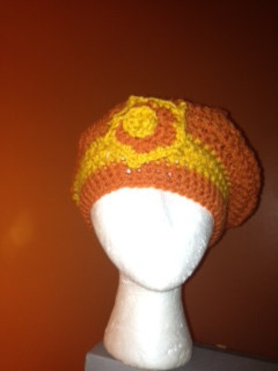 Items similar to Orange and yellow beret style hat on Etsy