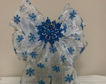 Winter wreath bow, sheer ribbon with blue and silver glitter snowflakes and matching snowflake center