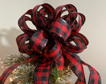Small Christmas tree topper bow or mailbox bow made with a black and red buffalo plaid ribbon