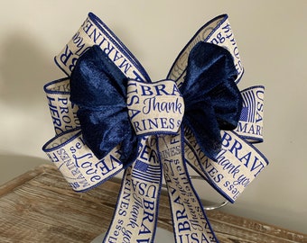 Marines Hero Wreath Bow , memorial marker natural burlap printed with “Brave , Hero, Marines“ and a coordinating blue chenille ribbon