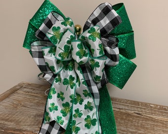 St. Patricks Day Bow, Green glitter , White and black check with Shamrock center ribbon .