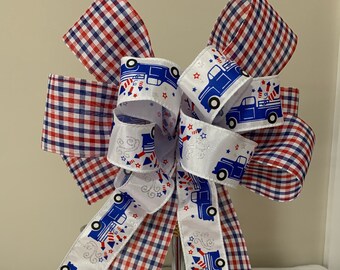 4 th of July celebration bow. Wreath bow. Red, White and Blue  plaid with truck and fireworks center ribbon Patriotic  bow