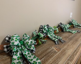 St. Patrick’s Day Garland 6 ft long, green glitter shamrocks,  carnations, natural burlap, sheet orange black and white plaid, bows