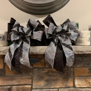 Set of 2 mantle / lantern bows pewter ribbon with black and silver glitter stripes set on a black glitter ribbon