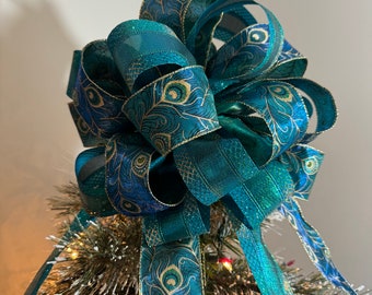 Teal green and blue shimmering ribbon and  Teal/green Peacock  Ribbon Christmas Tree topper bow 8ft. tails