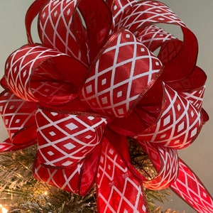 Large red ribbon with white glitter diamond pattern Christmas Tree topper bow