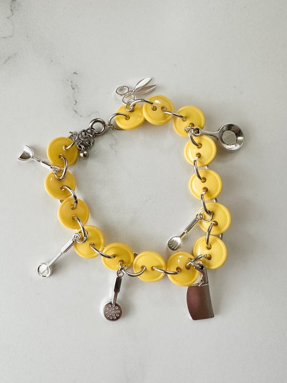 Handmade Charm Bracelet using reclaimed vintage bu