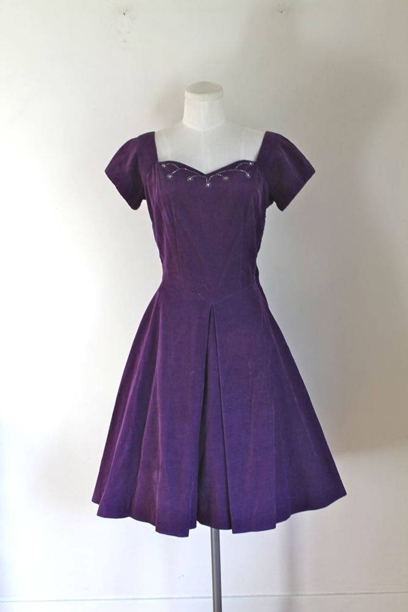 purple 1950's style dresses