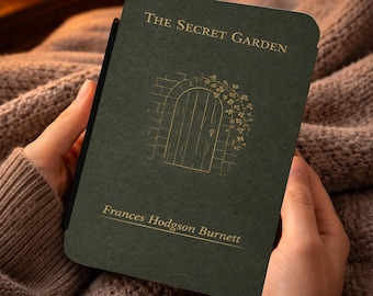May include: A dark green book cover with the title "The Secret Garden" and the author's name, Frances Hodgson Burnett, in gold lettering. The cover features a gold illustration of a door within a brick archway, with vines.