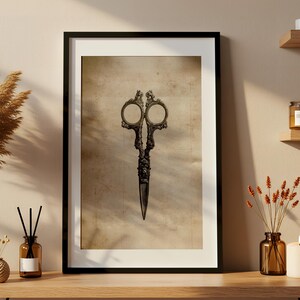 Ornate vintage scissors printable wall art. Antique detailed sketch with rustic parchment background. Perfect printable décor for sewing rooms, tailor studios, or craft spaces. Digital download for vintage home decoration and seamstress gifts.