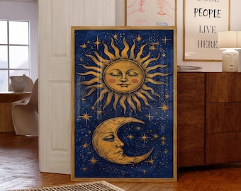 May include: A rectangular framed wall art print featuring a golden sun with a human face and a golden crescent moon with a human face set against a deep blue starry night sky. The sun is positioned above the moon, both surrounded by golden stars.