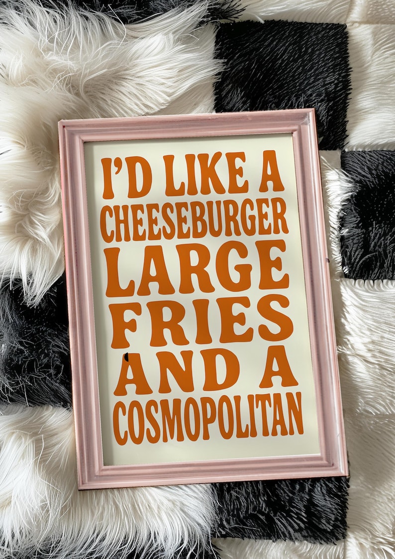 funny kitchen wall art with cheeseburger fries and cosmopolitan quote in bold retro typography
