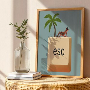Framed escape key poster styled with a glass vase and wicker table in natural sunlight – modern boho wall decor.
