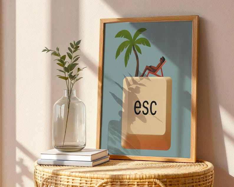 Framed escape key poster styled with a glass vase and wicker table in natural sunlight – modern boho wall decor.