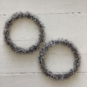 Two Small Silver Tinsel Wreaths