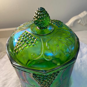 Indiana Glass Irredescent Green Carnival glass. Harvey Grape pattern canister or cookie jar