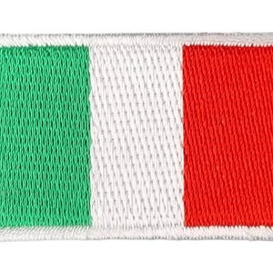 May include: Embroidered patch depicting the Italian flag. The rectangular patch features three vertical stripes: green on the left, white in the centre, and red on the right. The flag is bordered by a white stitched edge.