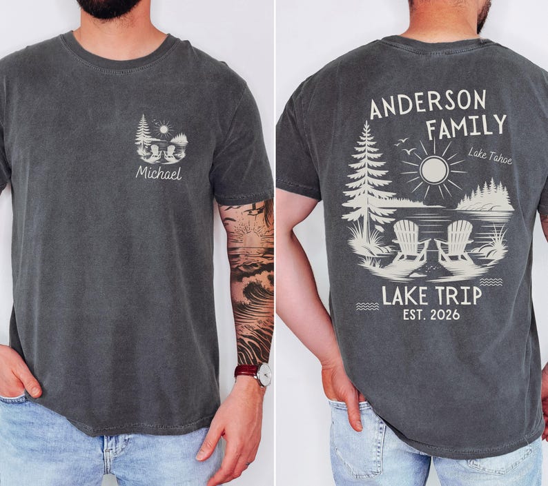 May include: A charcoal grey t-shirt featuring a small graphic on the front left chest with the name Michael and a lake scene. The back displays a large graphic with the text Anderson Family, Lake Tahoe, Lake Trip, and Est. 2026.