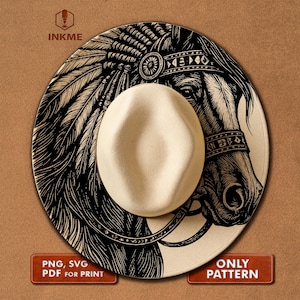 May include: A cream-colored fedora hat with a black and white graphic of a Native American headdress and a horse's head. The hat has a wide brim and a classic crown. The image includes the text "INKME", "PNG, SVG PDF FOR PRINT", and "ONLY PATTERN".