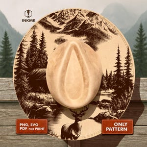 May include: A tan cowboy hat with a detailed landscape design featuring mountains, trees, a cabin, and a deer. The hat has a light brown crown and a wide brim. The image includes the text "PNG, SVG, PDF FOR PRINT" and "ONLY PATTERN".