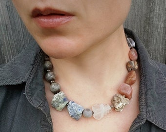 Chunky Tribal Statement Necklace with pink sunstone, blue lapis lazuli, gray labradorite, quartz, fossils, and fluorite