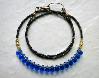 Dainty Blue & Gold Necklace, beaded necklace with bottle blue glass drops, black and gold accents, perfect for layering